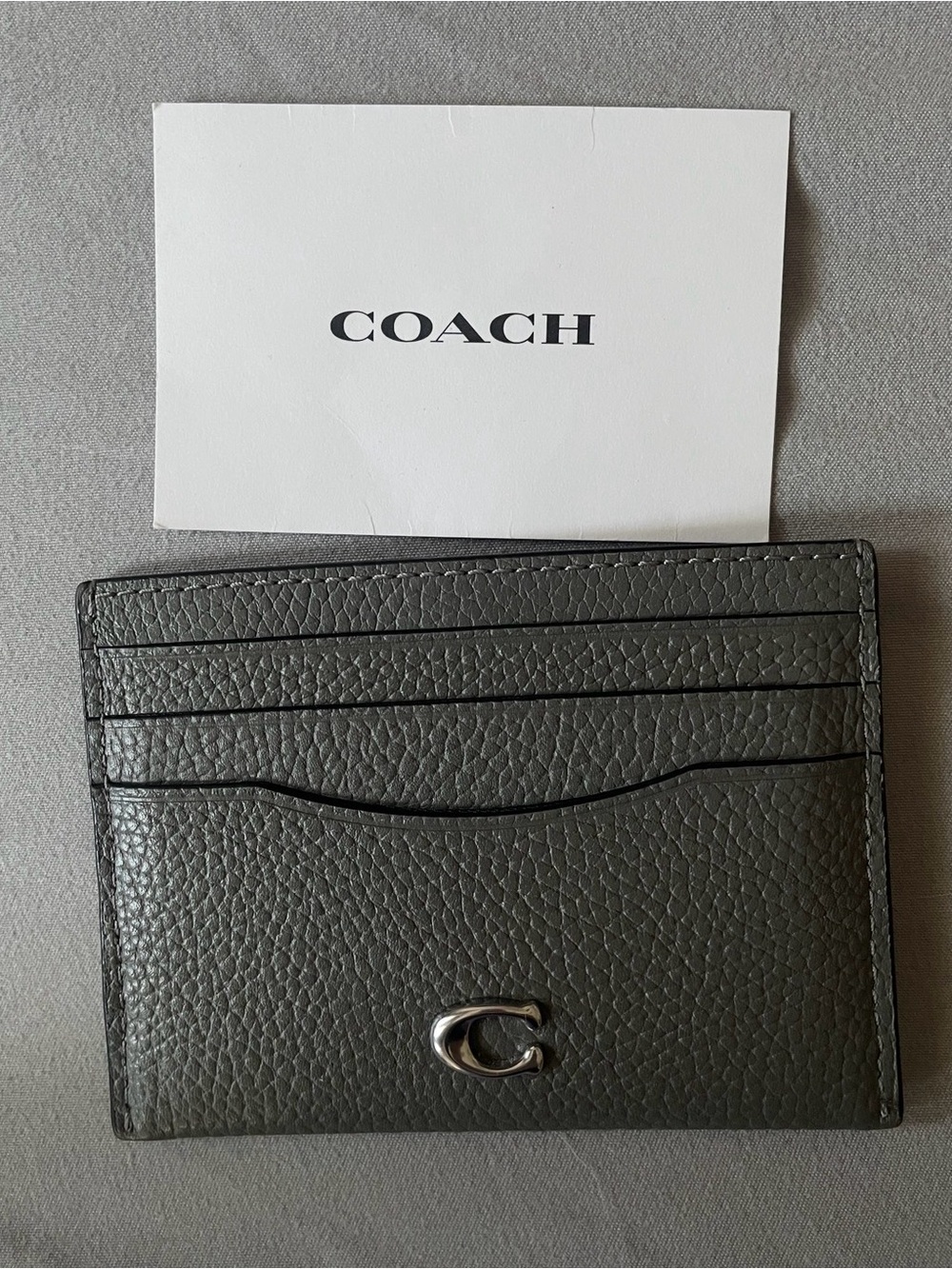 Coach Pebbled Leather Card Holder in gray, silver logo (6 slots) - like new